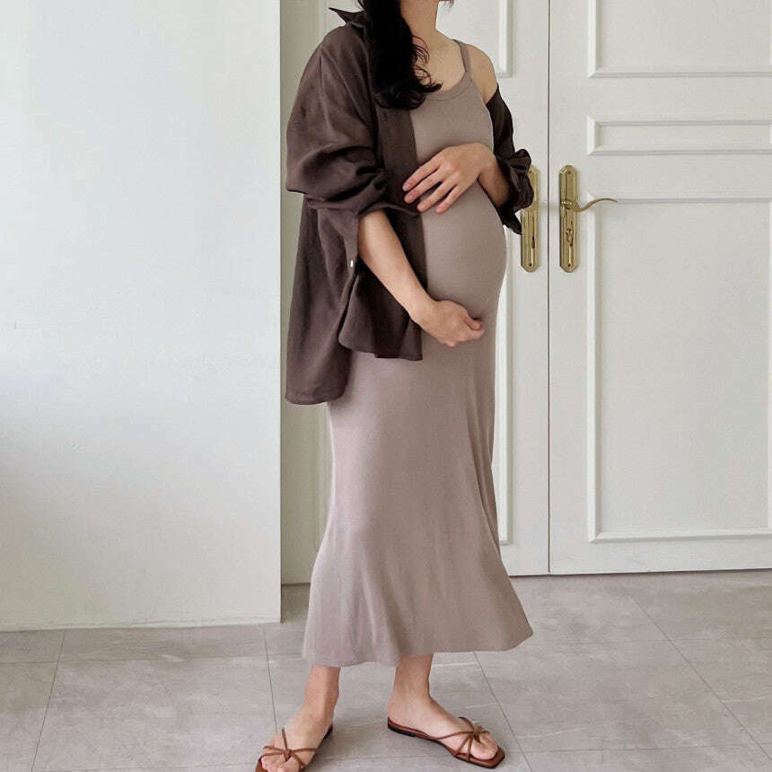 MUMMY.cc:春夏修身羅紋吊帶後開衩連身裙