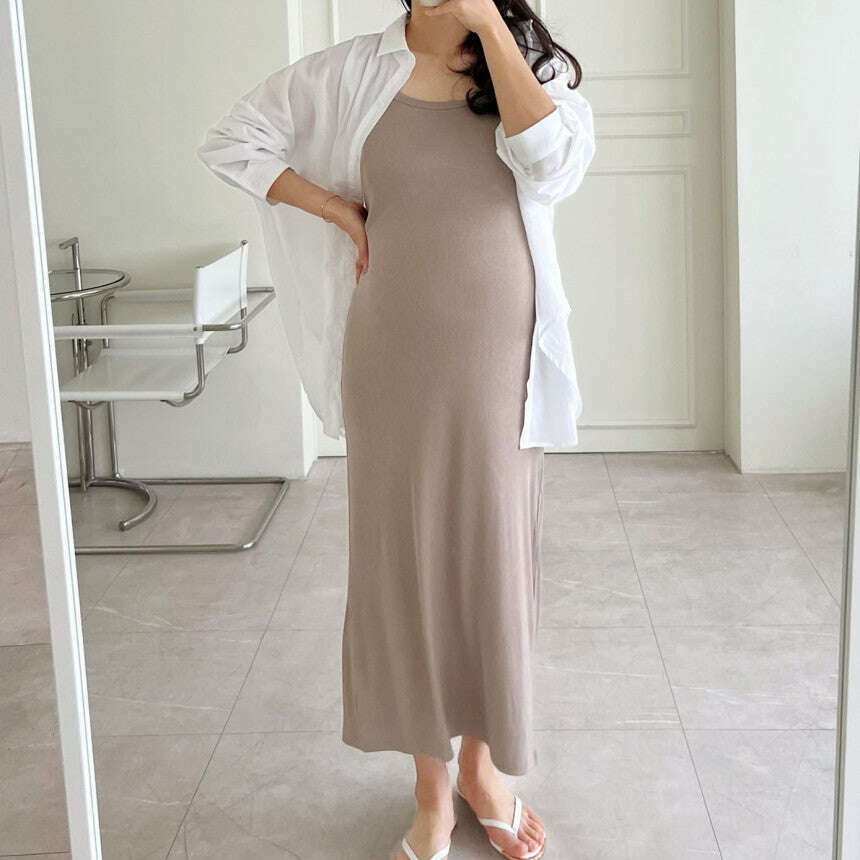 MUMMY.cc:春夏修身羅紋吊帶後開衩連身裙