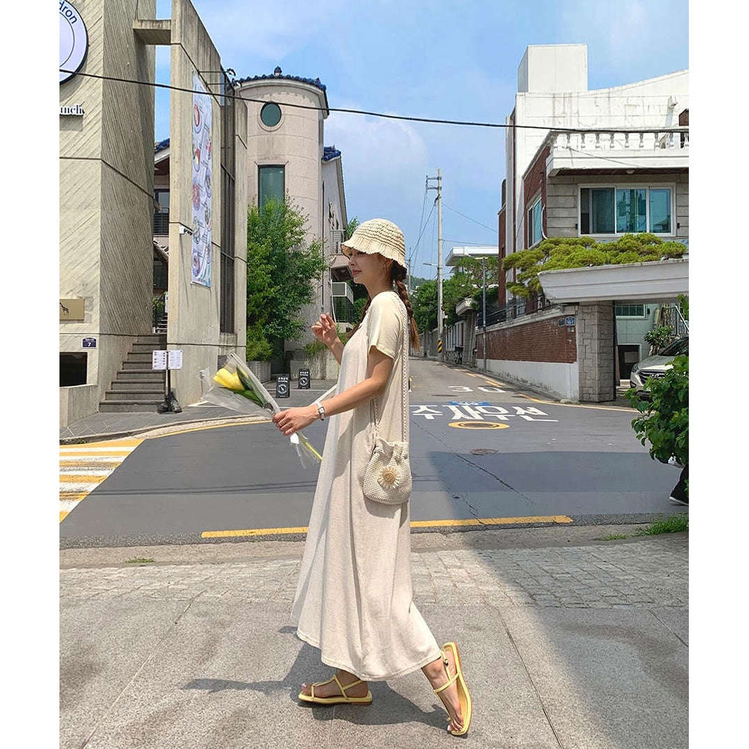 MUMMY.cc:夏日吊帶棉麻透氣連身裙