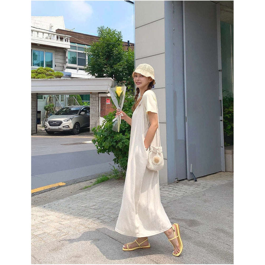 MUMMY.cc:夏日吊帶棉麻透氣連身裙