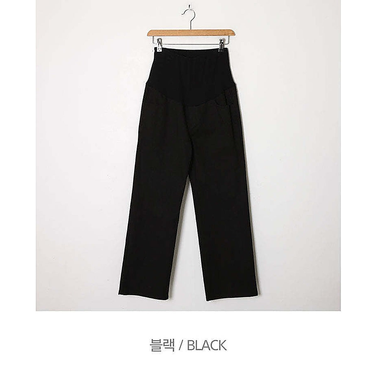 模特兒實穿綠色長裙，站於街頭側身｜孕婦棉質寬腳褲（第 40 張）