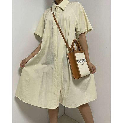 模特側身企，米白色連身裙，手拎棕色大托特袋，裙襬揚起｜孕婦翻領帶口袋A line襯衫連身裙（第 24 張）