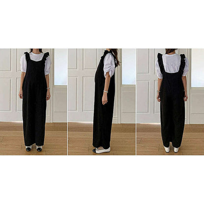 模特兒實穿黑色連身裙配白襯衫，站於鏡前｜孕婦荷葉肩帶Jumpsuit（第 22 張）