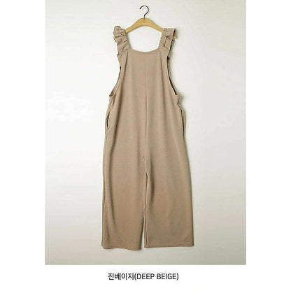 模特兒實穿黑色連身裙配白襯衫，站於鏡前｜孕婦荷葉肩帶Jumpsuit（第 23 張）
