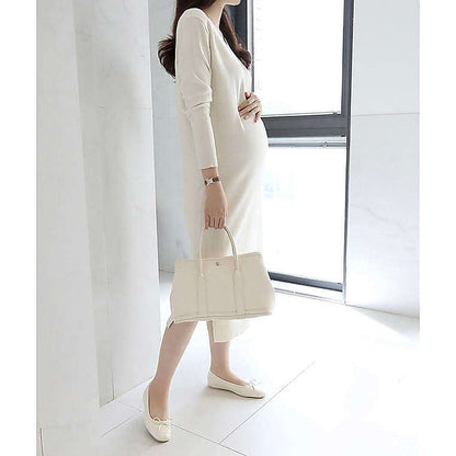 模特兒實穿米白色長裙，站於鏡前手持外套｜Stella soft v-neck knit ops（第 11 張）