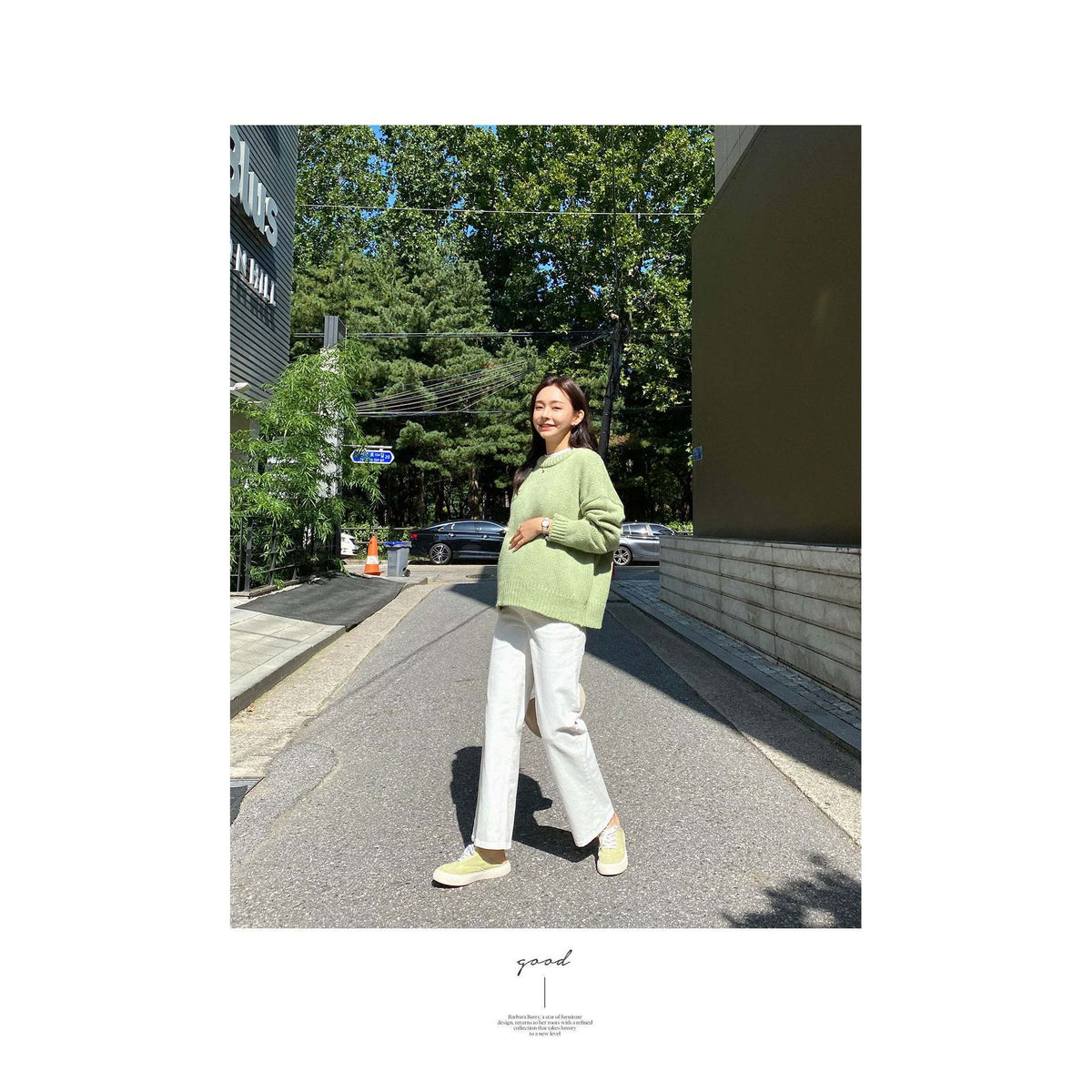 模特兒實穿綠色長裙，站於街頭側身｜孕婦棉質寬腳褲（第 25 張）